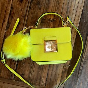 Aldo Yellow Crossbody Bag with Gold Clasp and Smooth Finish